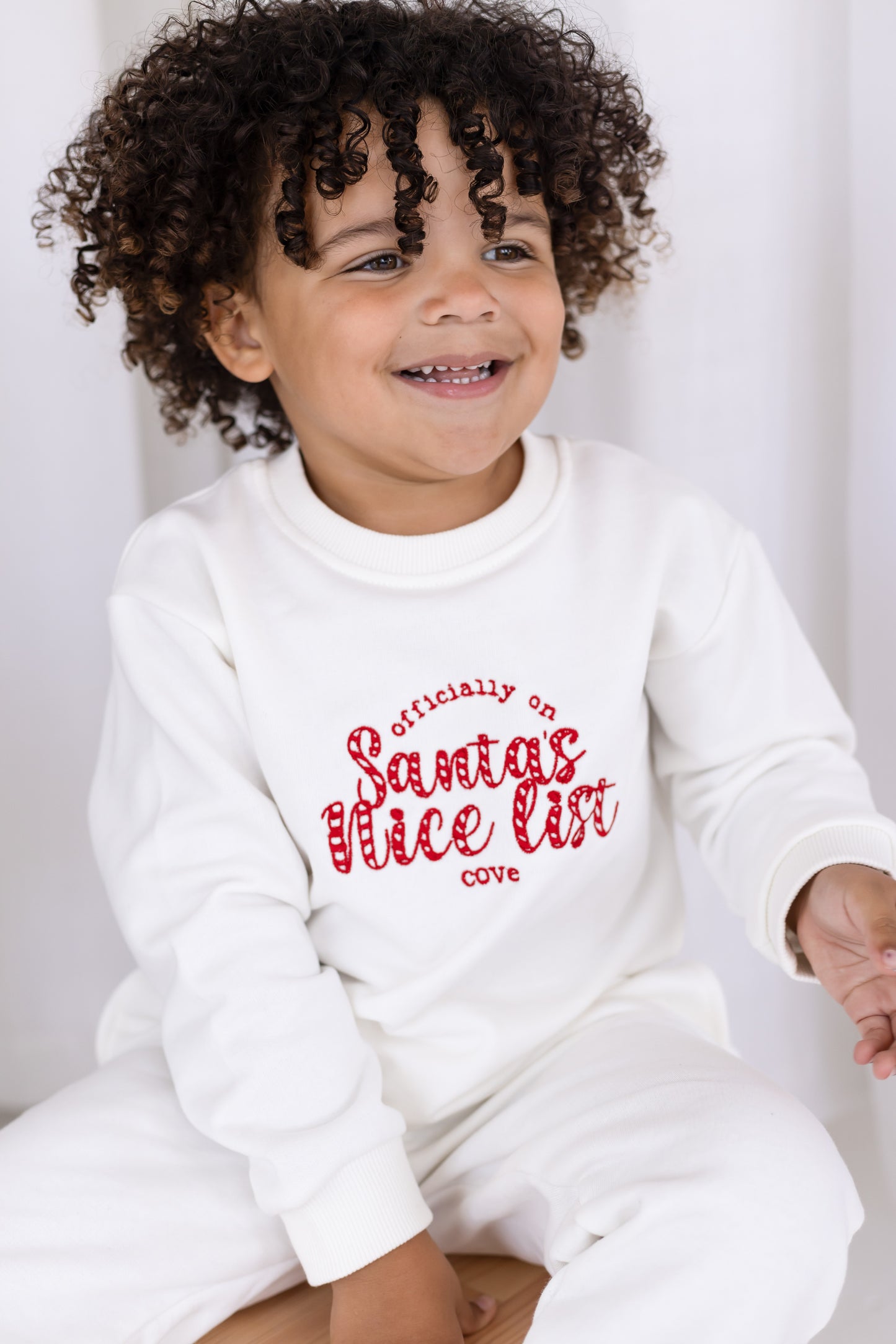 'Too cute for Santa's Naughty List' Christmas Candy Cane Embroidery Sweatshirt
