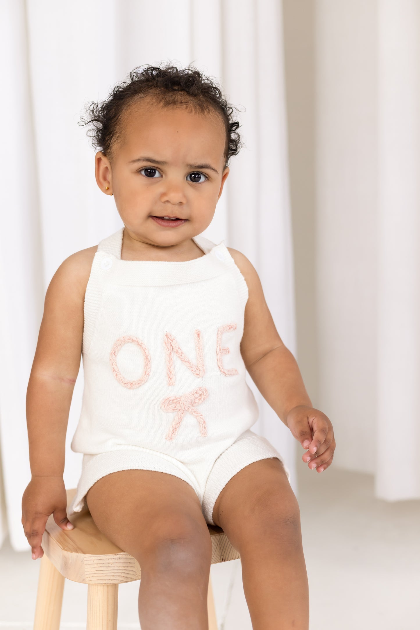 Baby First Birthday 'One' knitted frill and bow detail romper