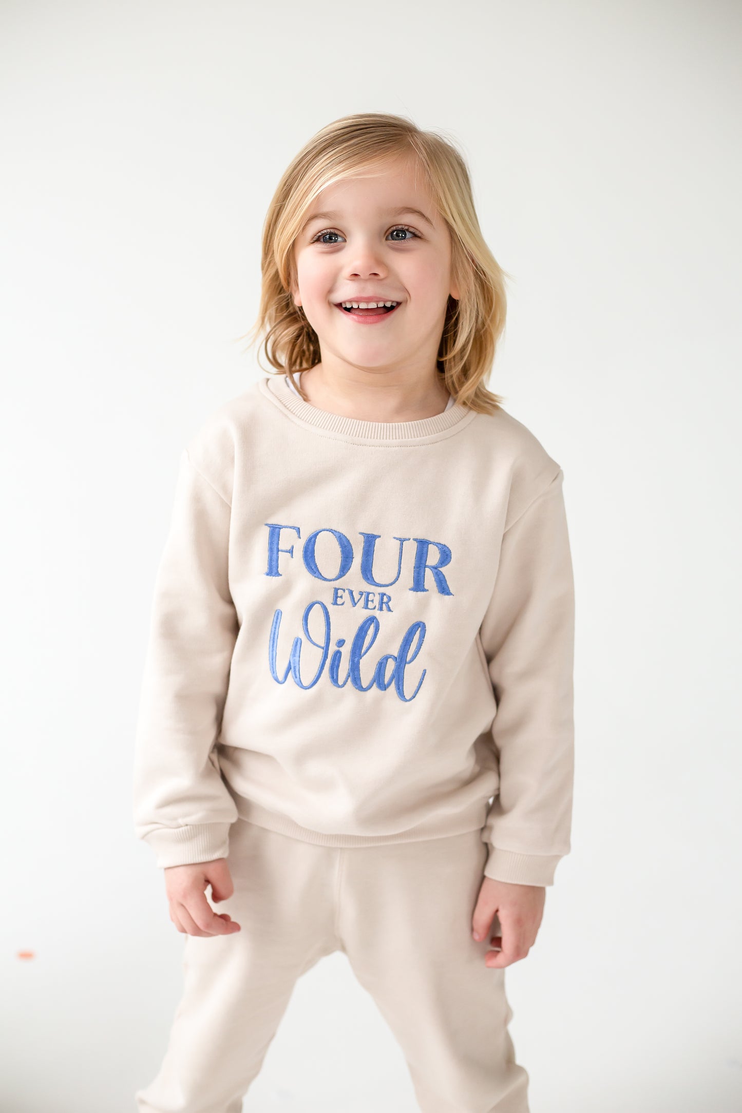'Four ever Wild' Fourth birthday embroidered sweatshirt