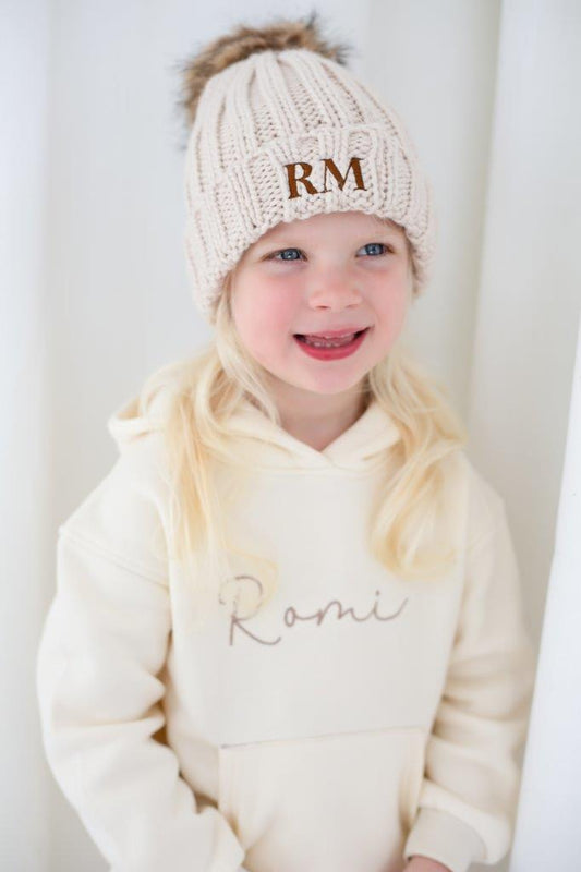 AW Embroidered initials faux fur pom pom hat