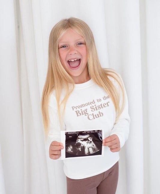 'Promoted to big sister' embroidered sweatshirt
