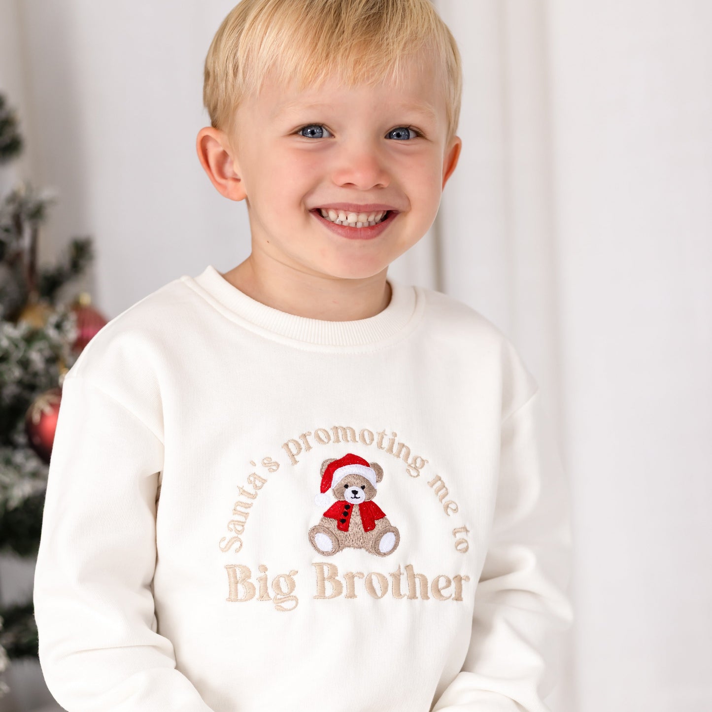 'Santa's Promoting me to Big Sister/Brother' embroidered Christmas New Baby Announcement Sweatshirt