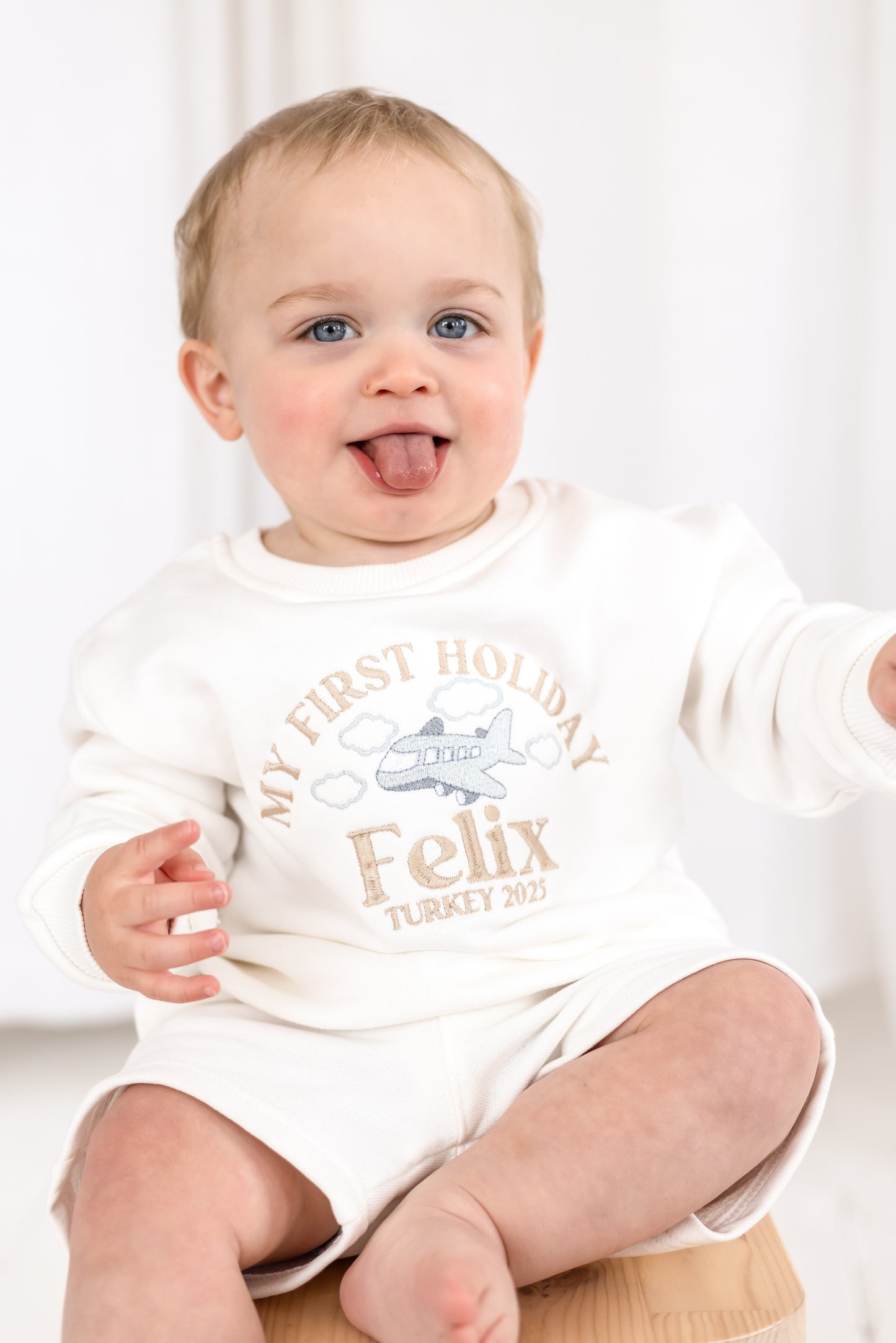 'My First Holiday 26' personalised name aeroplane embroidered holiday sweatshirt