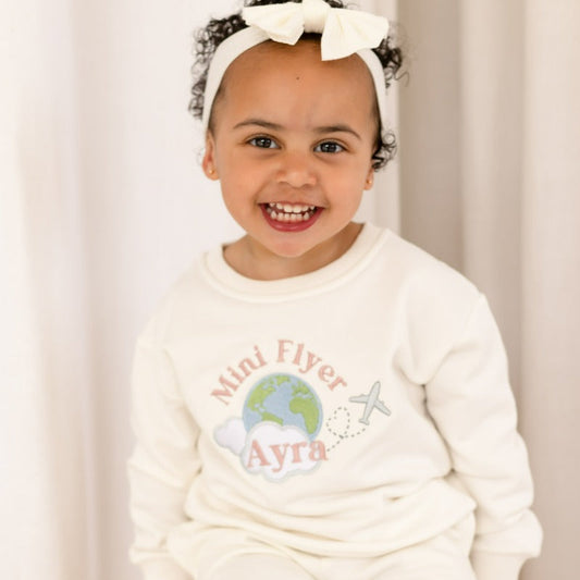 'First time/ Mini Flyer' personalised globe embroidered holiday sweatshirt