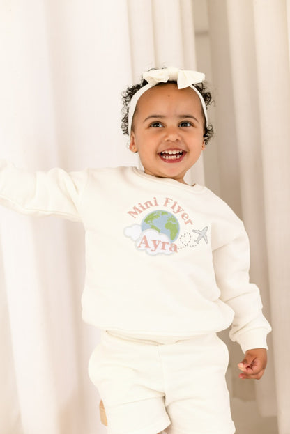 'First time/ Mini Flyer' personalised globe embroidered holiday sweatshirt