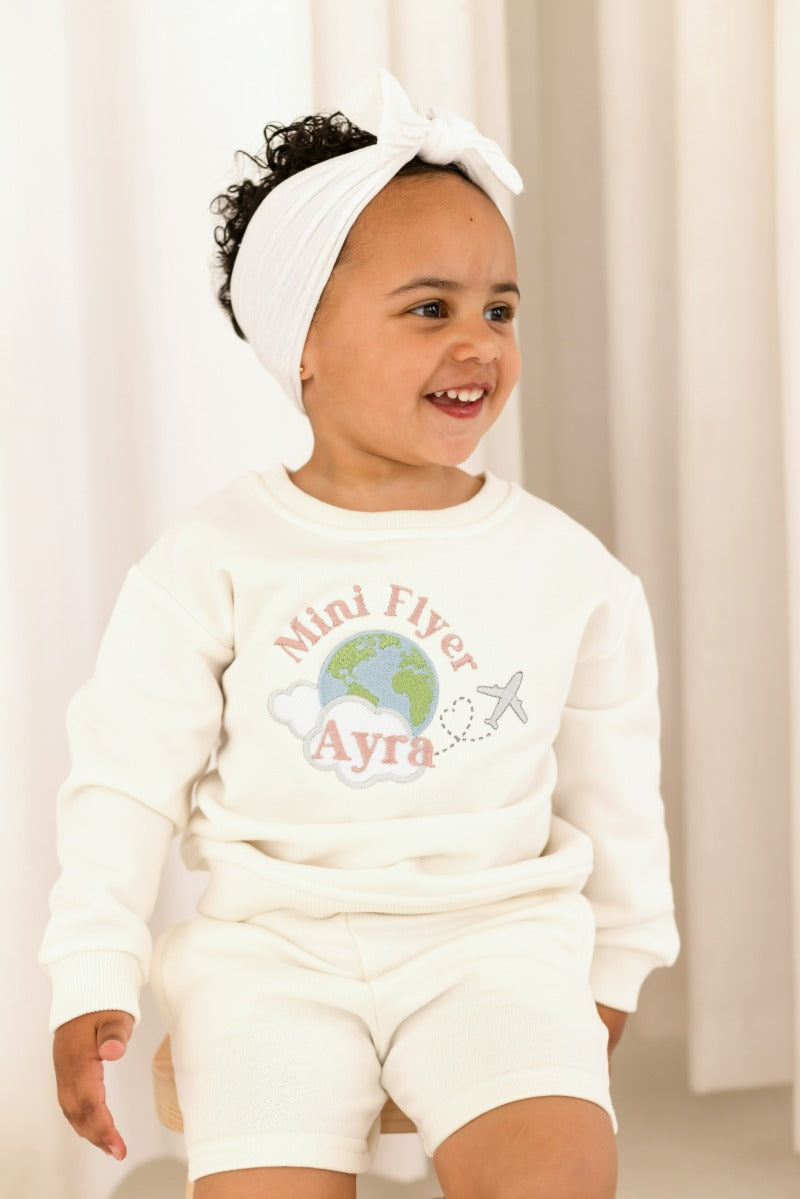 'First time/ Mini Flyer' personalised globe embroidered holiday sweatshirt