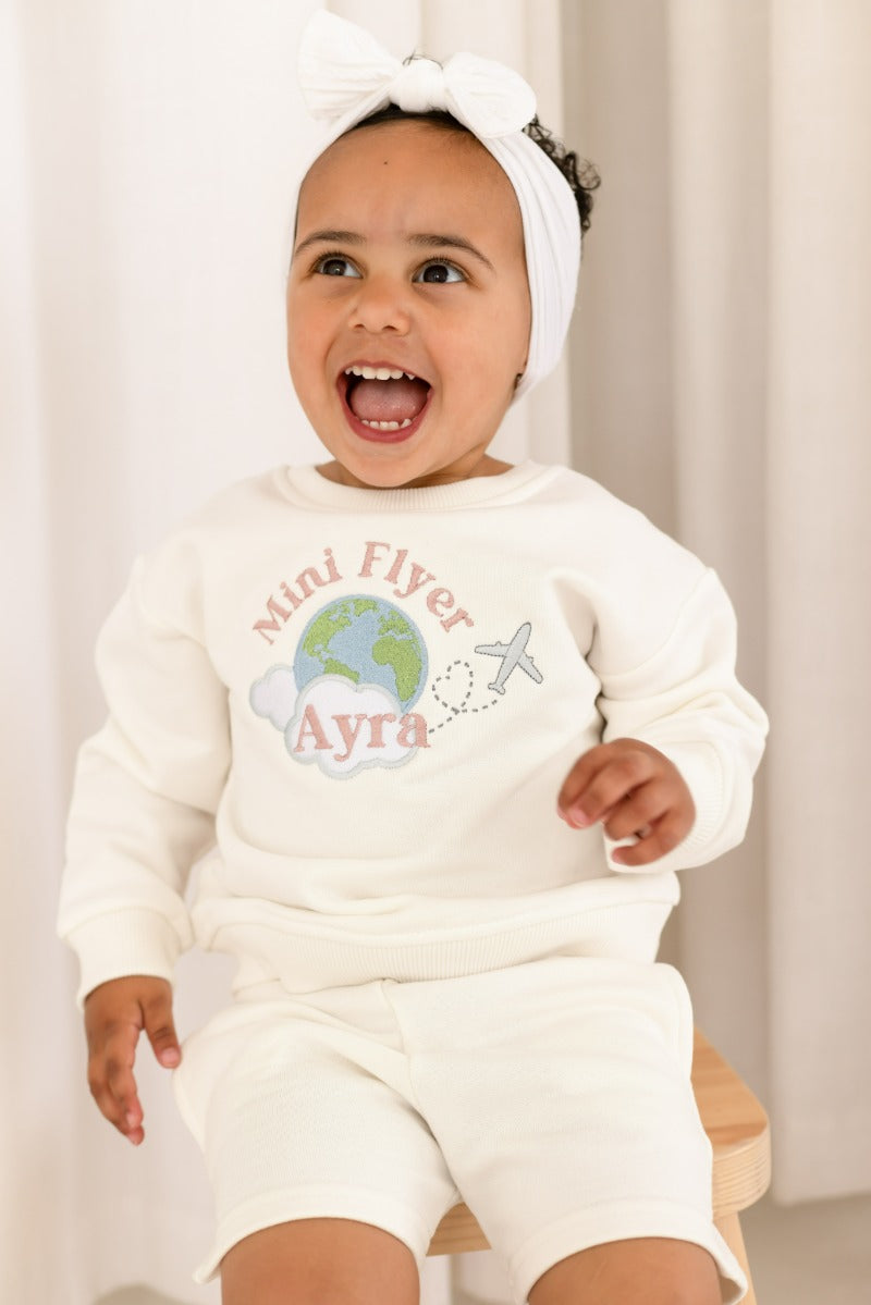 'First time/ Mini Flyer' personalised globe embroidered holiday sweatshirt