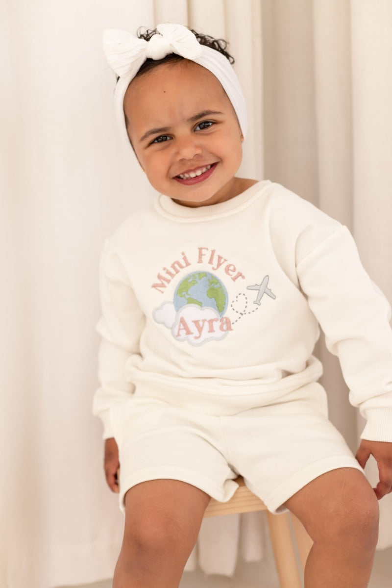 'First time/ Mini Flyer' personalised globe embroidered holiday sweatshirt
