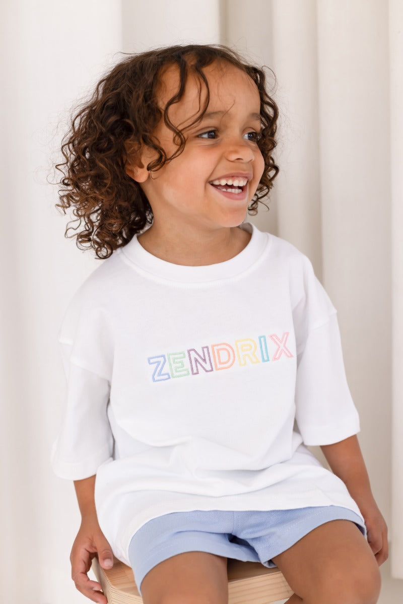 Rainbow capitals personalised name embroidered t shirt