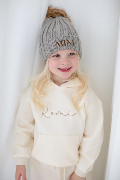 AW Embroidered initials faux fur pom pom hat