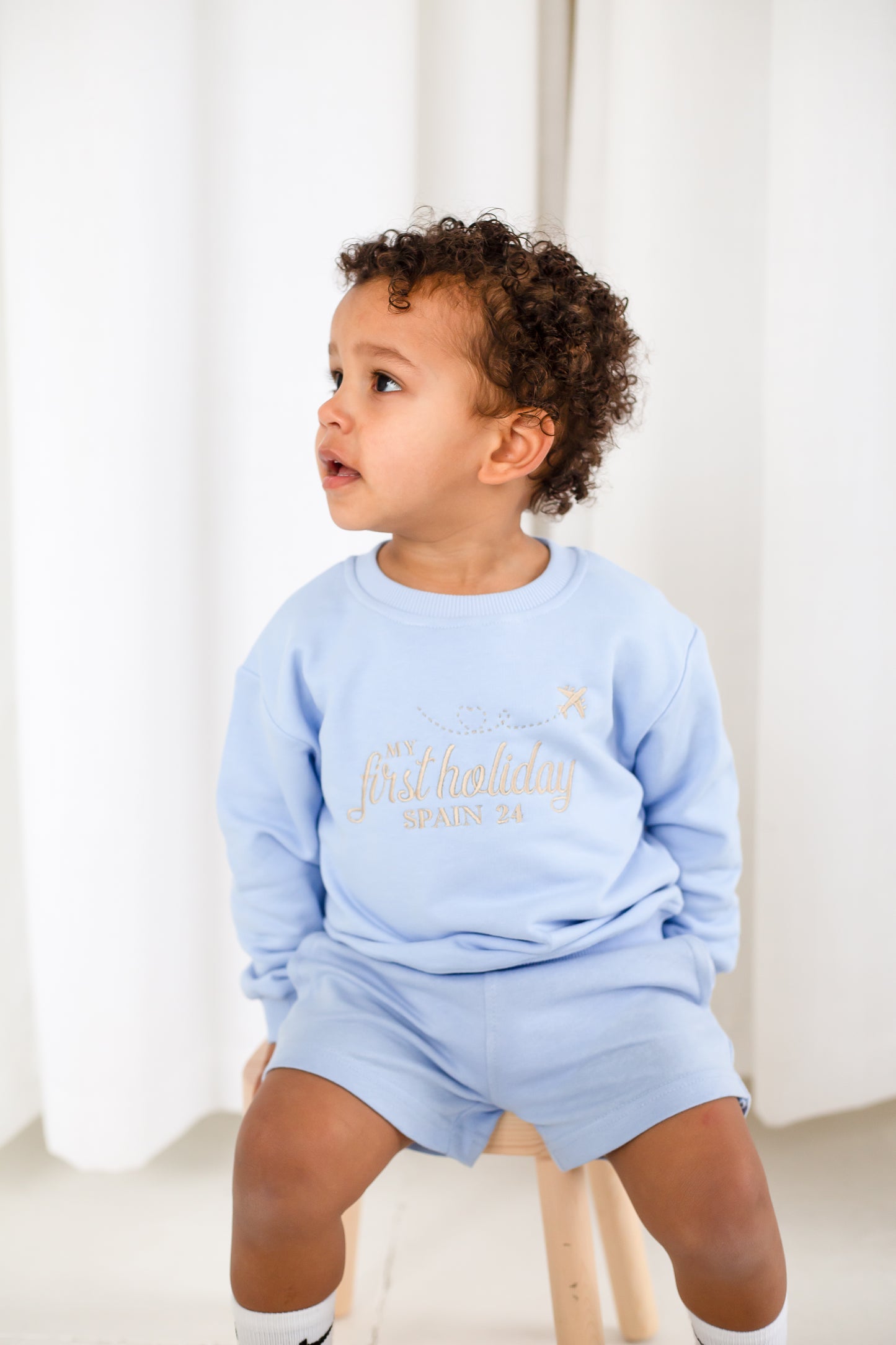 'My First Holiday' personalised embroidered sweatshirt