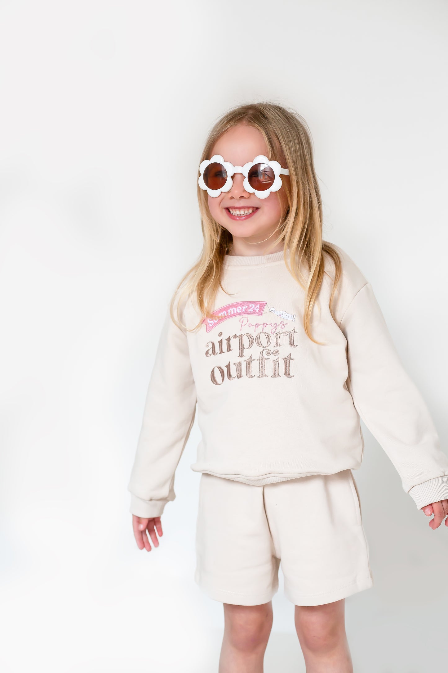 Stone 'Airport Outfit' personalised embroidered sweatshirt