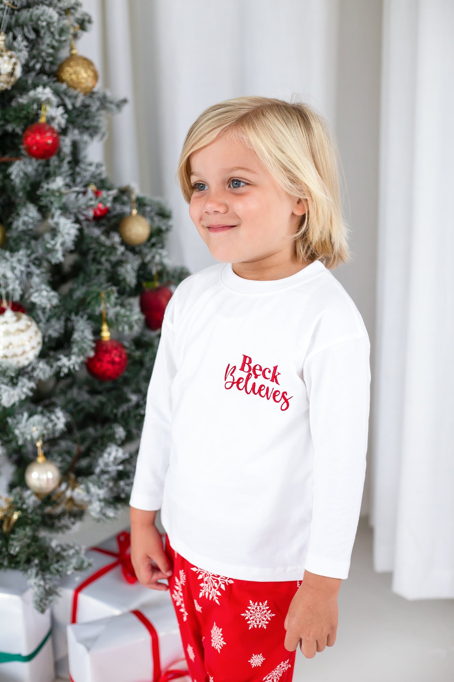 Family Christmas personalised 'Believes' snowflake jersey pyjamas in red and green