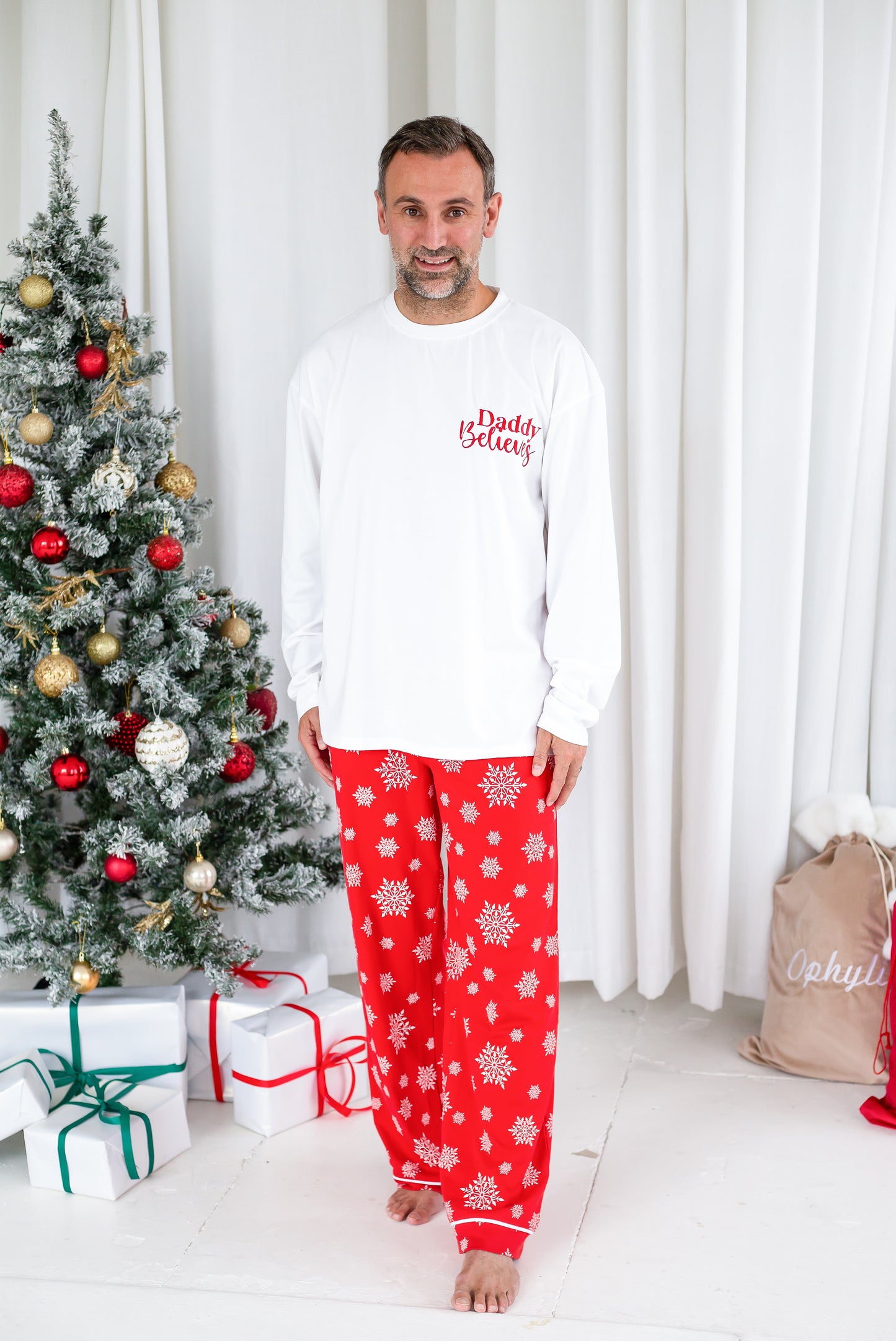Family Christmas personalised 'Believes' snowflake jersey pyjamas in red and green
