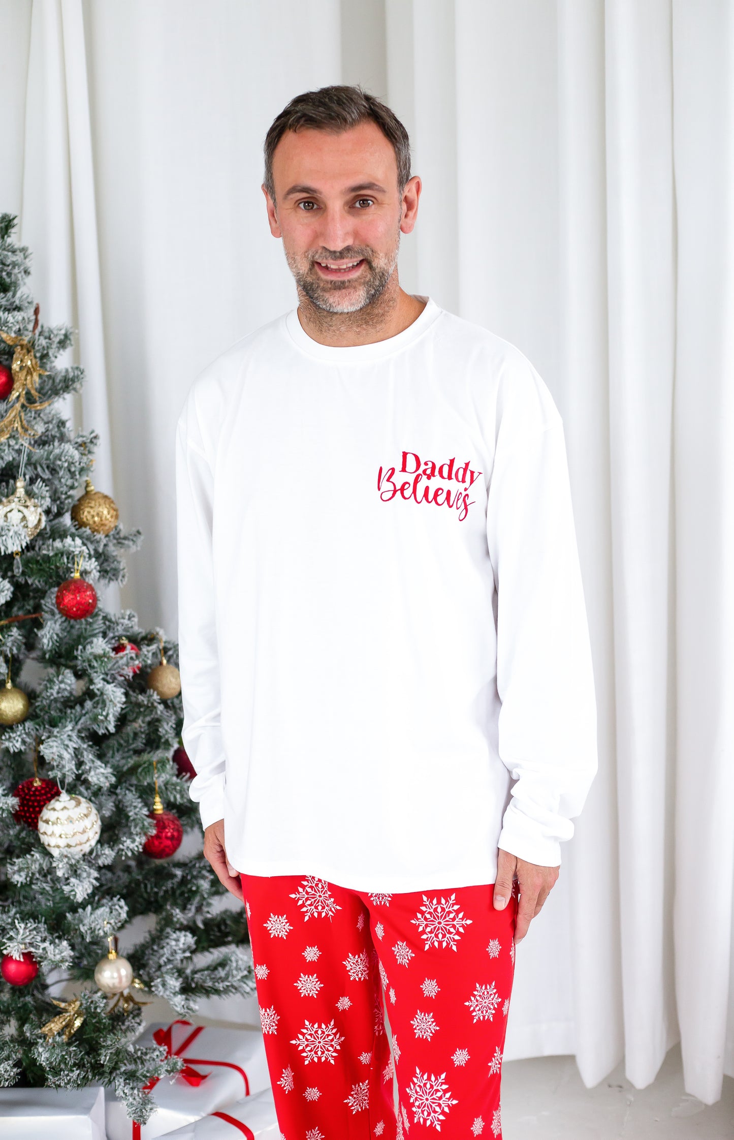 Family Christmas personalised 'Believes' snowflake jersey pyjamas in red and green