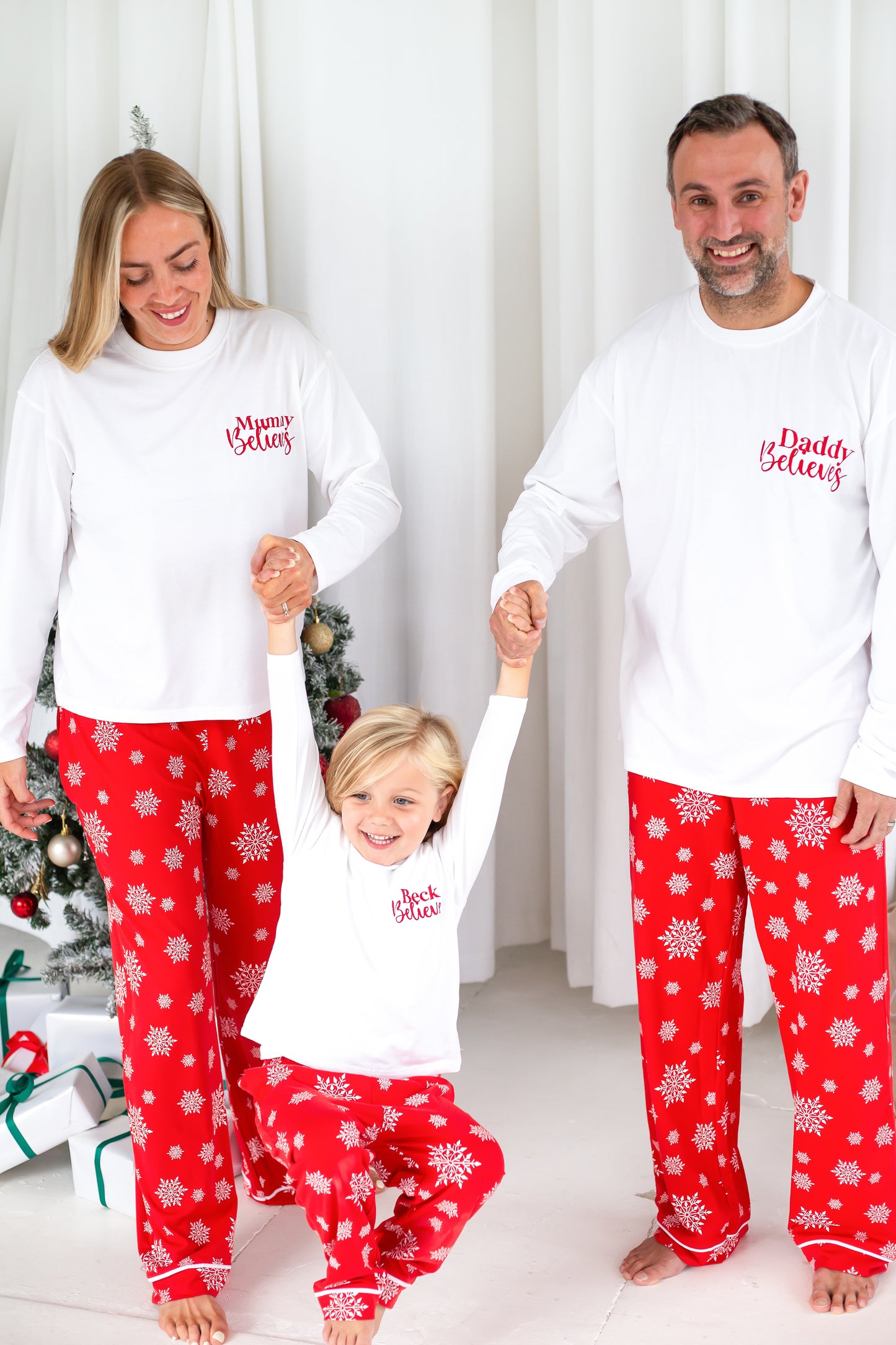 Family Christmas personalised 'Believes' snowflake jersey pyjamas in red and green