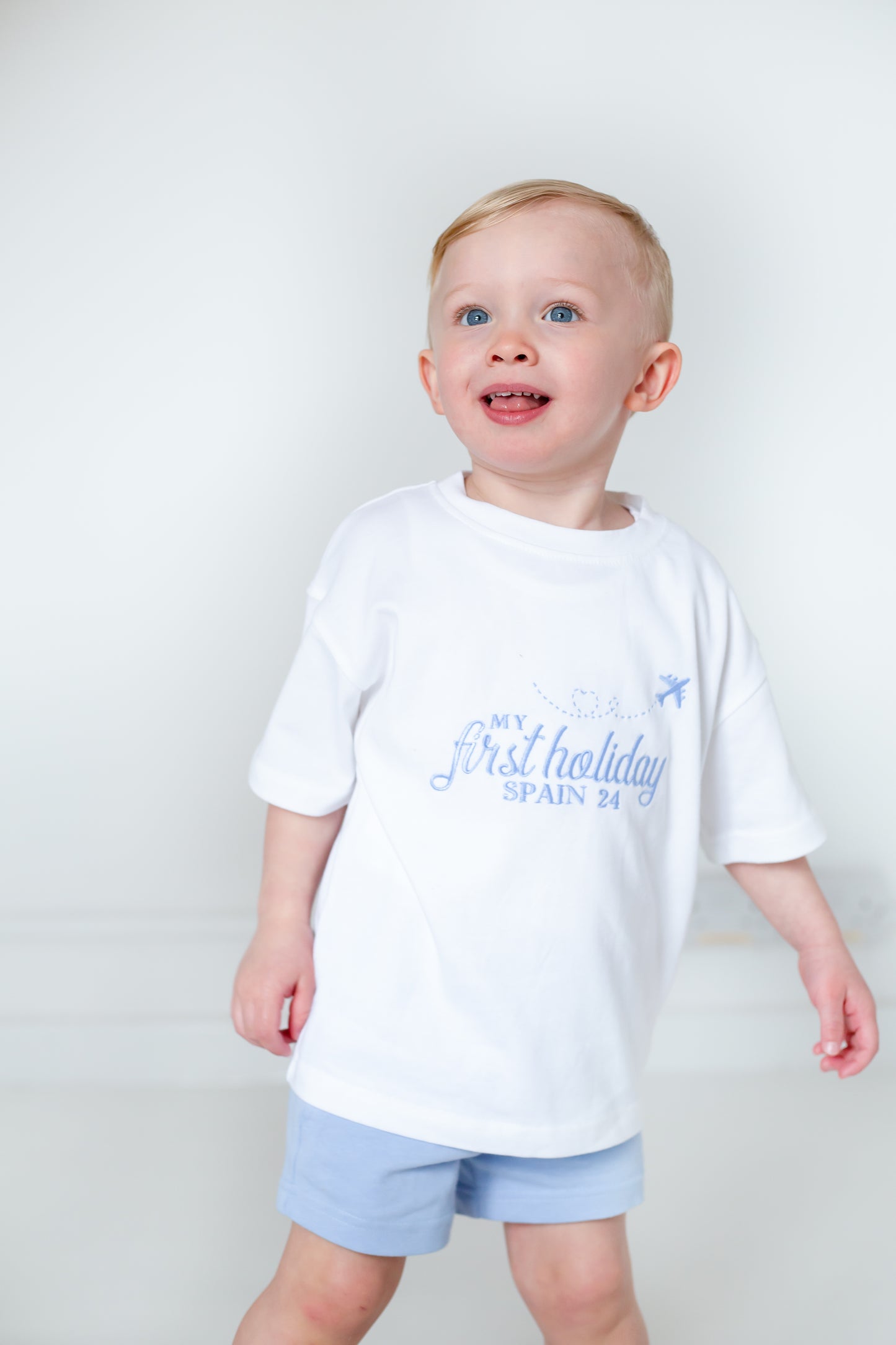 'My First Holiday' personalised embroidered t shirt