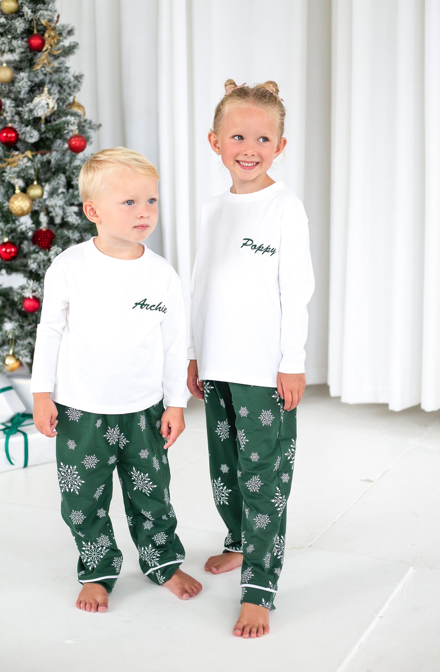Family Christmas personalised snowflake jersey pyjamas in green and red
