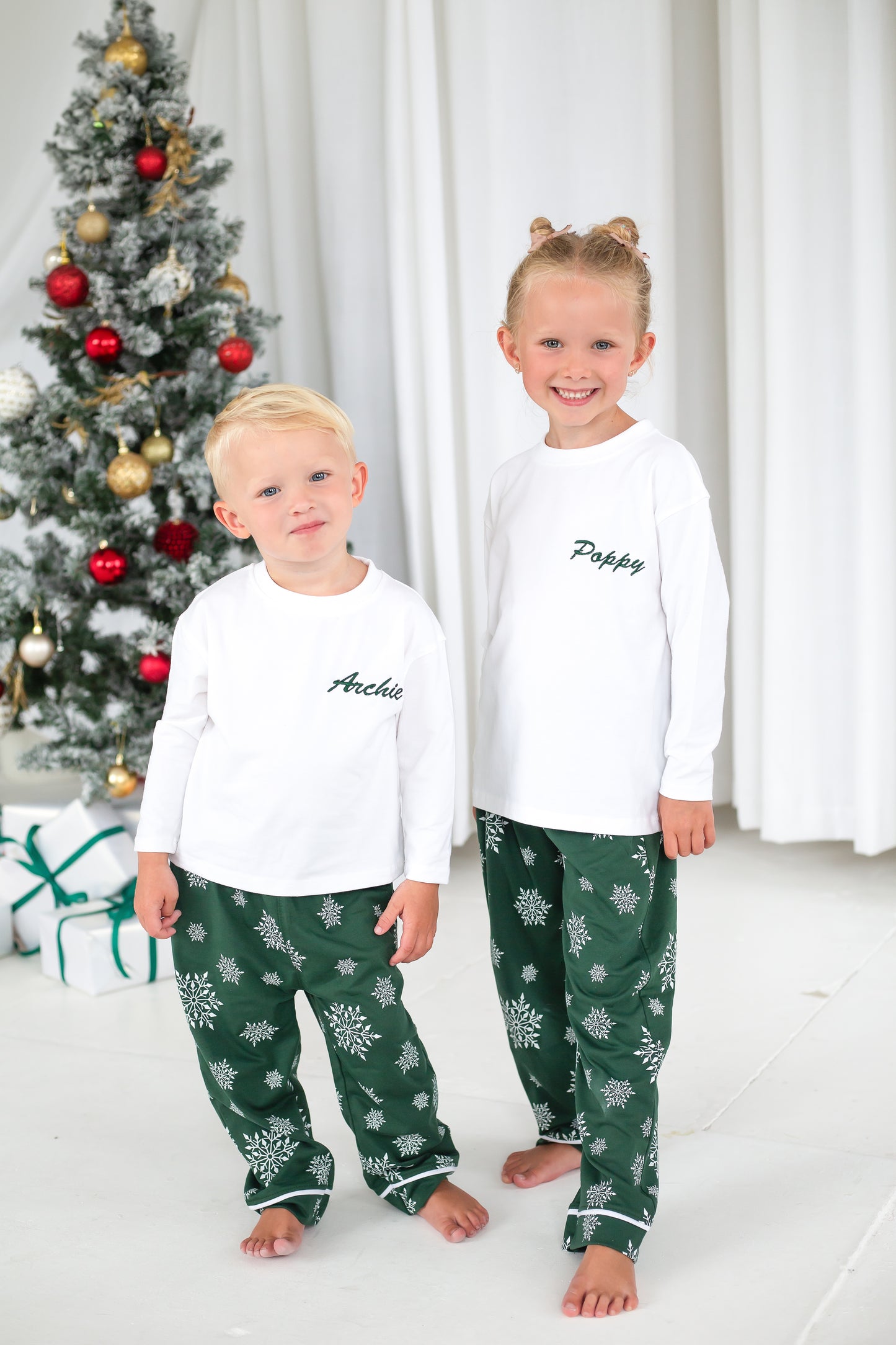Family Christmas personalised snowflake jersey pyjamas in green and red