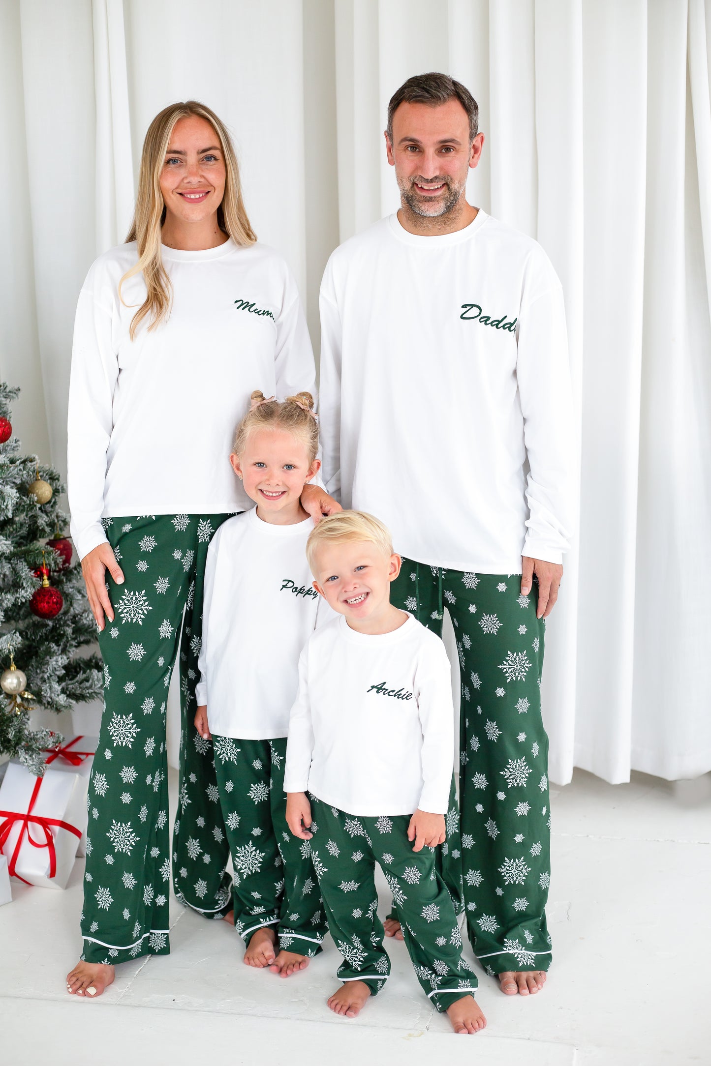 Family Christmas personalised 'Believes' snowflake jersey pyjamas in red and green