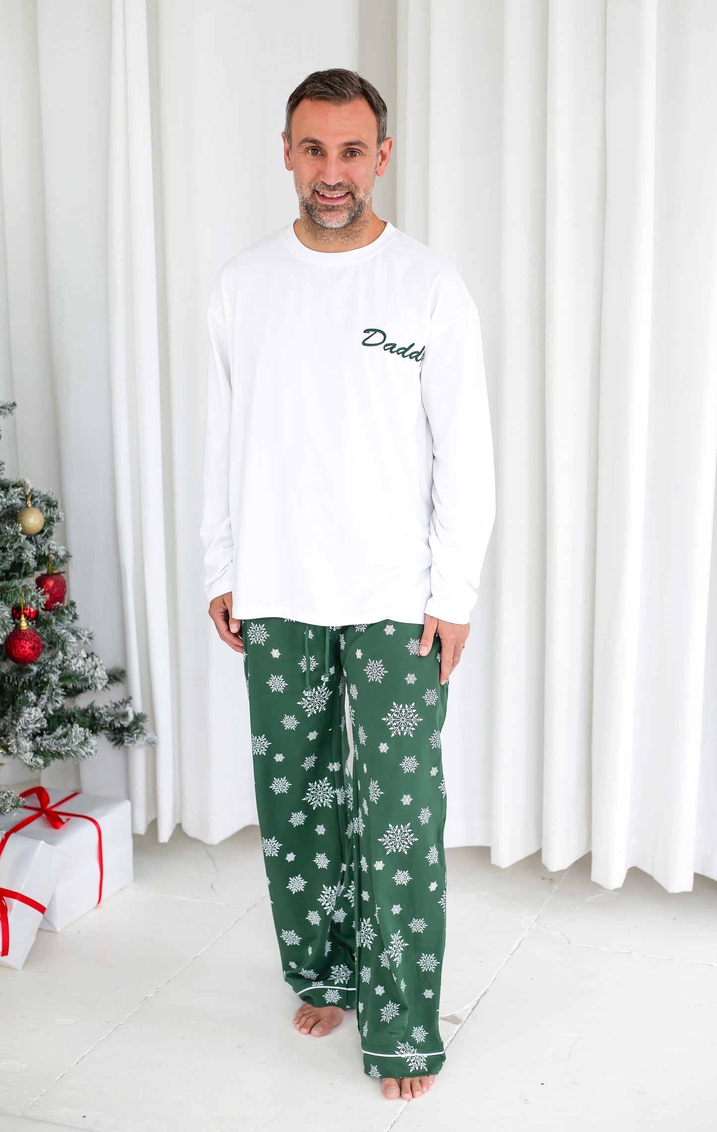 Family Christmas personalised snowflake jersey pyjamas in green and red