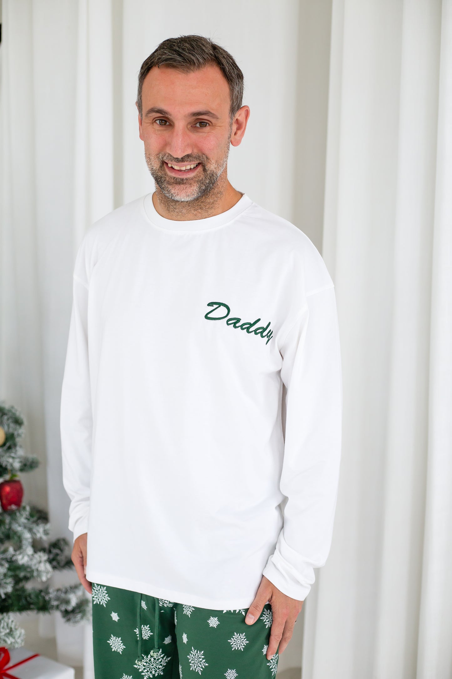 Family Christmas personalised snowflake jersey pyjamas in green and red