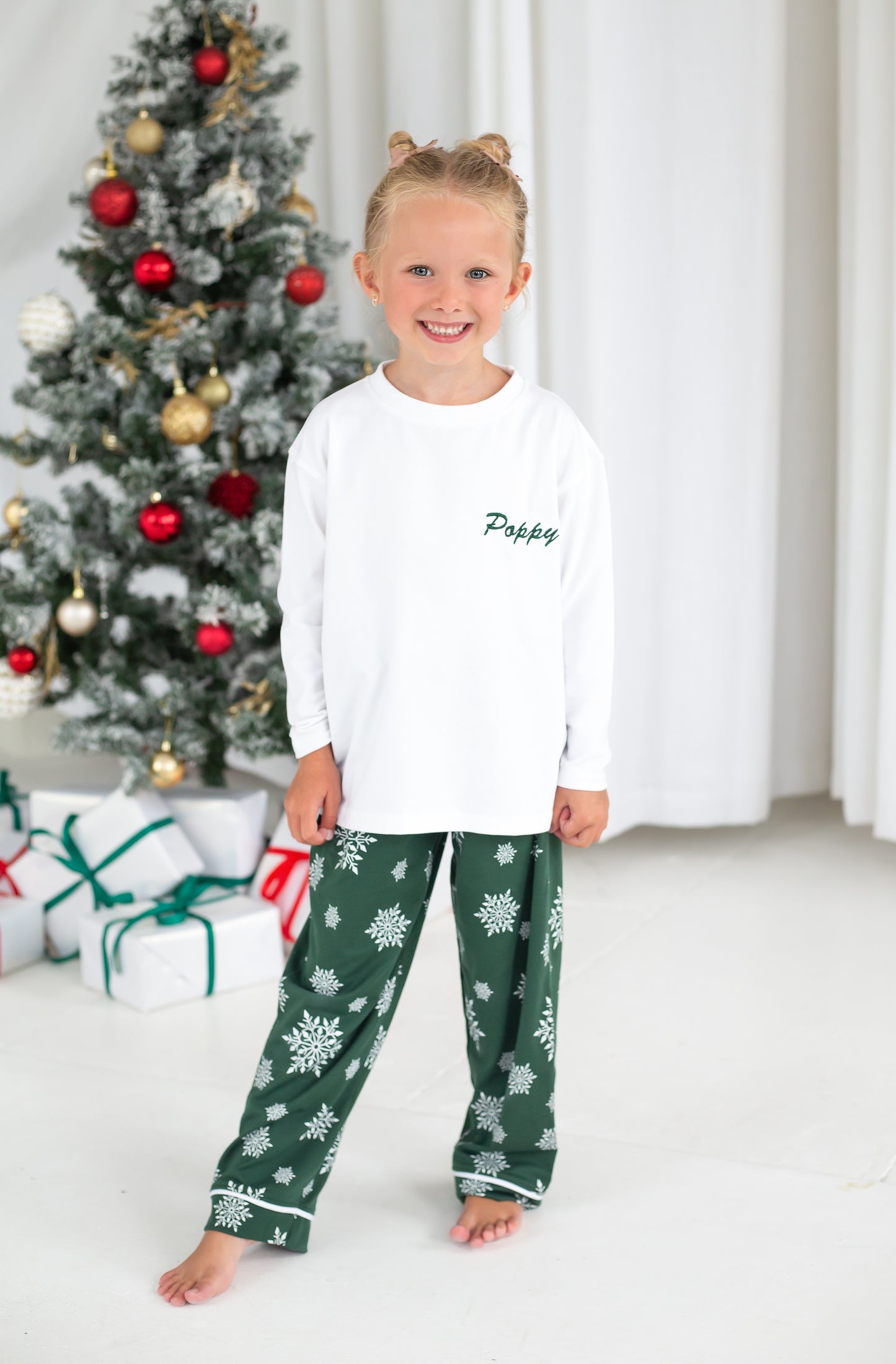 Family Christmas personalised snowflake jersey pyjamas in green and red