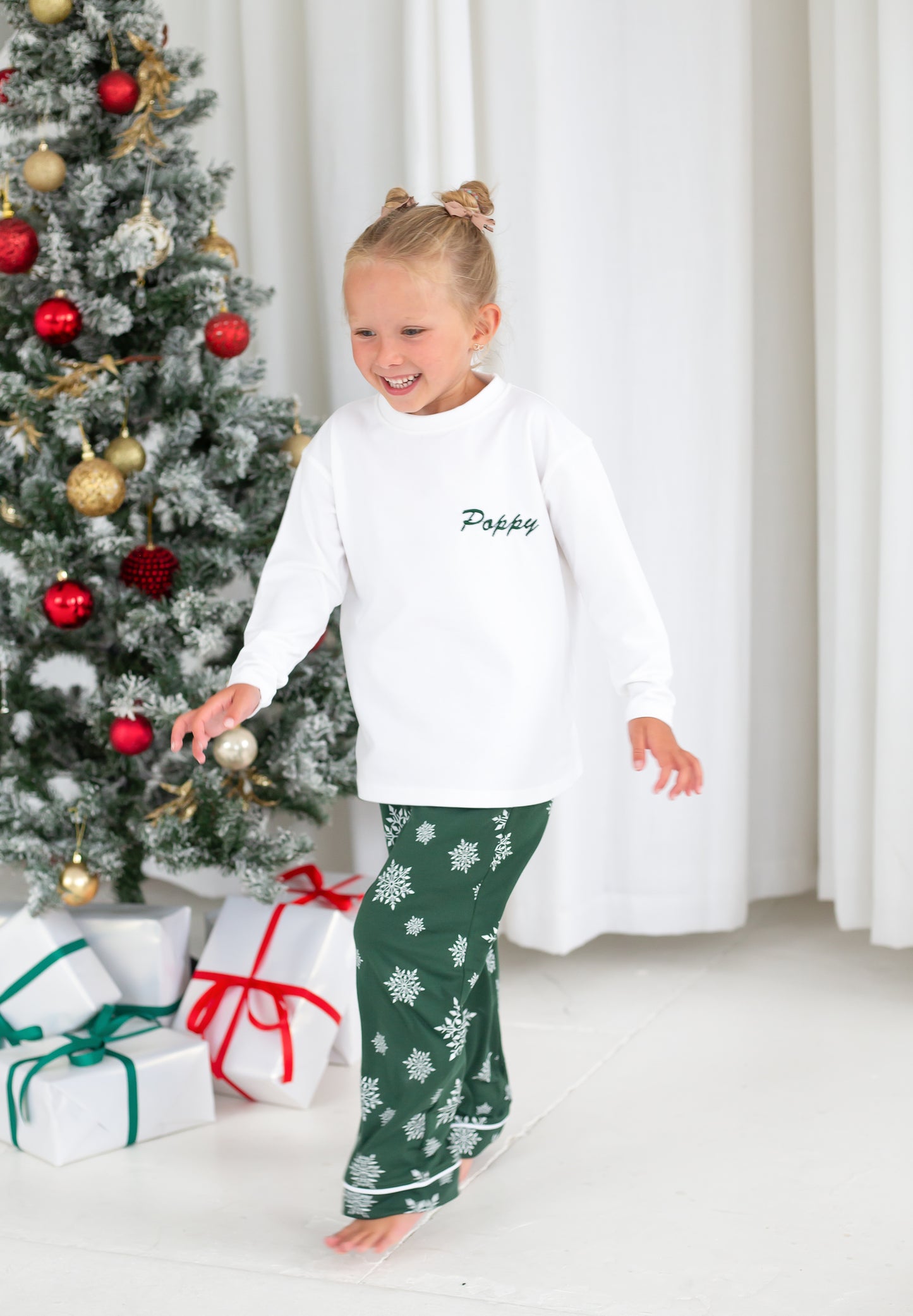 Family Christmas personalised snowflake jersey pyjamas in green and red