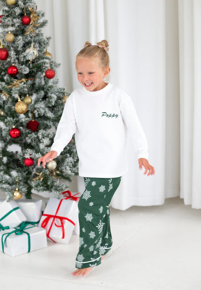 Family Christmas personalised snowflake jersey pyjamas in green and red