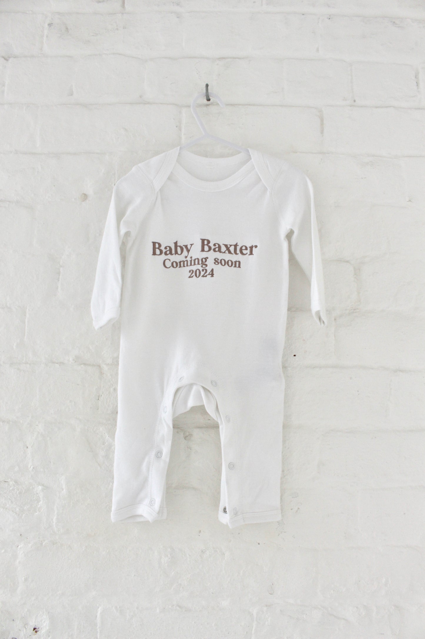 'Coming soon' long sleeve babygro